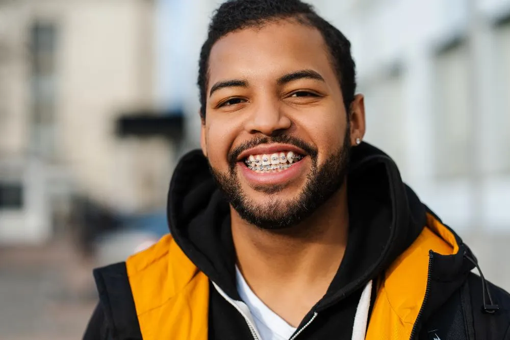 student with dental braces
