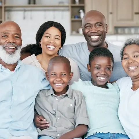 Family and friends smiling together