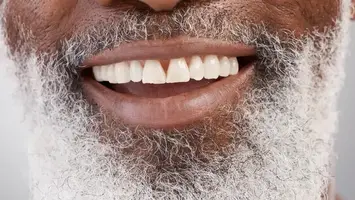 Senior man smiling with healthy teeth